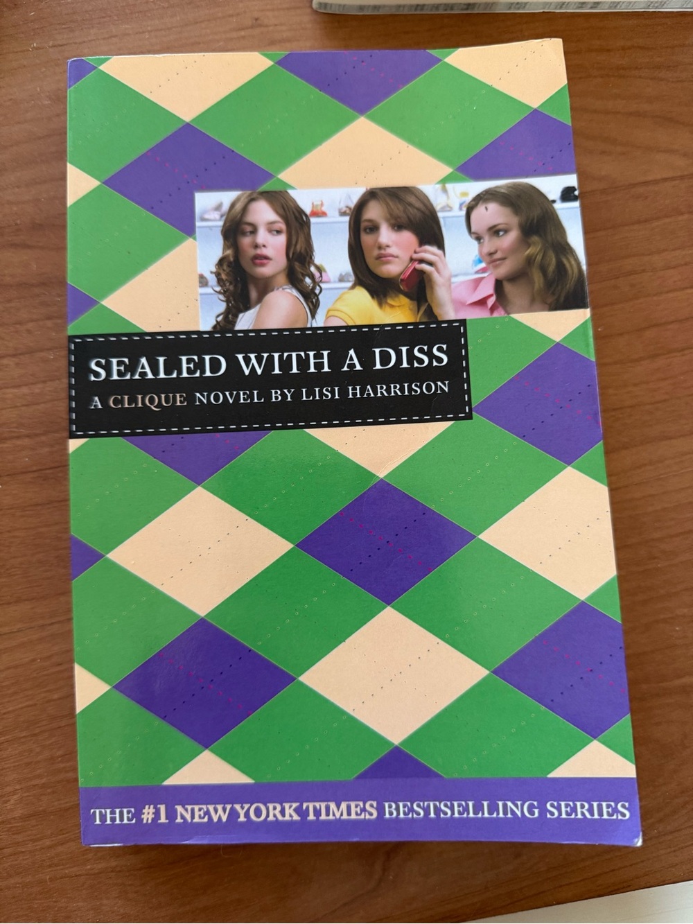 Sealed With a Diss — Green & Purple Patterned Paperback Novel